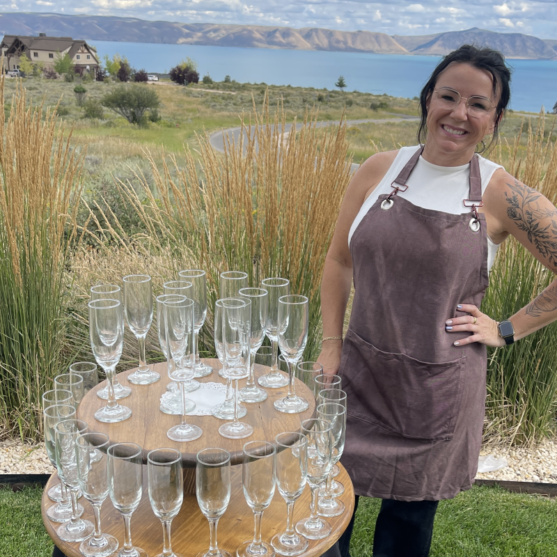 Photo of Amberdee (Owner) with an arrengement of champagne glasses.