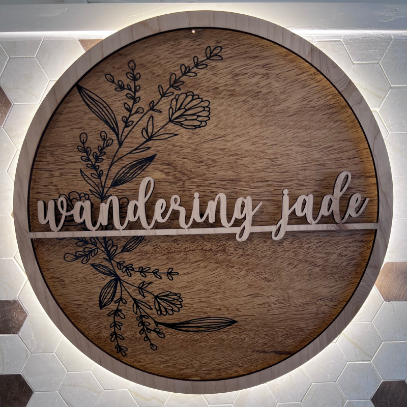 Photo of the Wooden Wandering Jade sign.