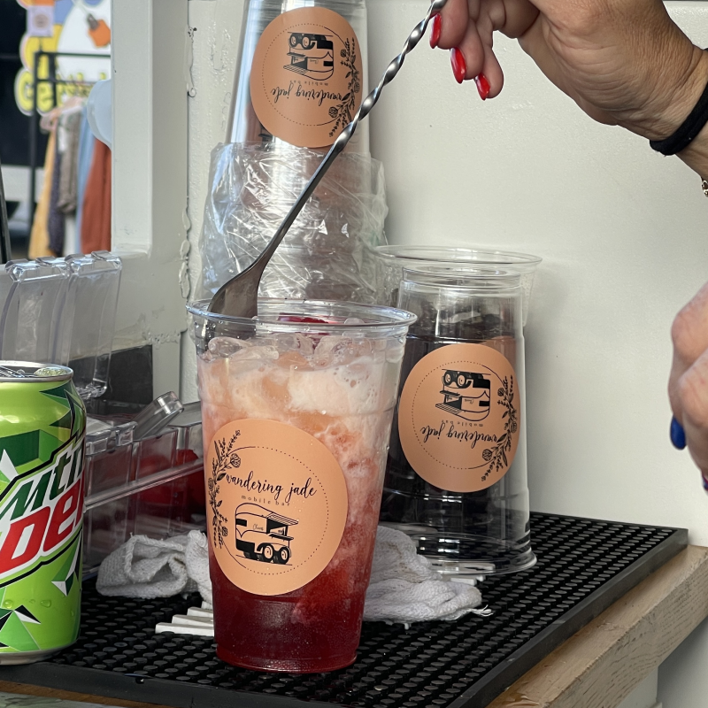 Photo of drinks being made behind the counter.