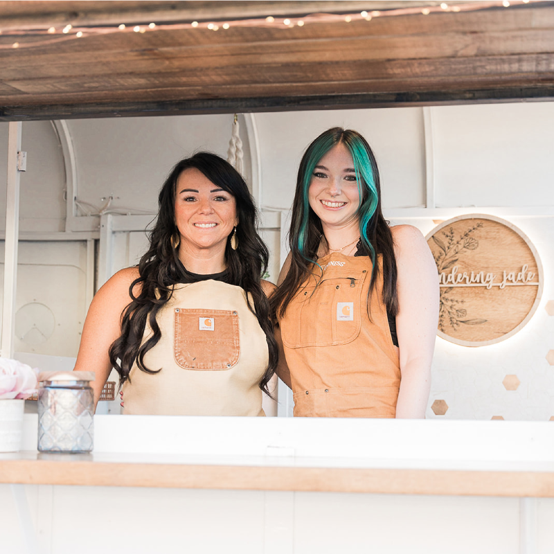 Photo of Amberdee (Owner) and KateLynn (Bartender) behind the counter.