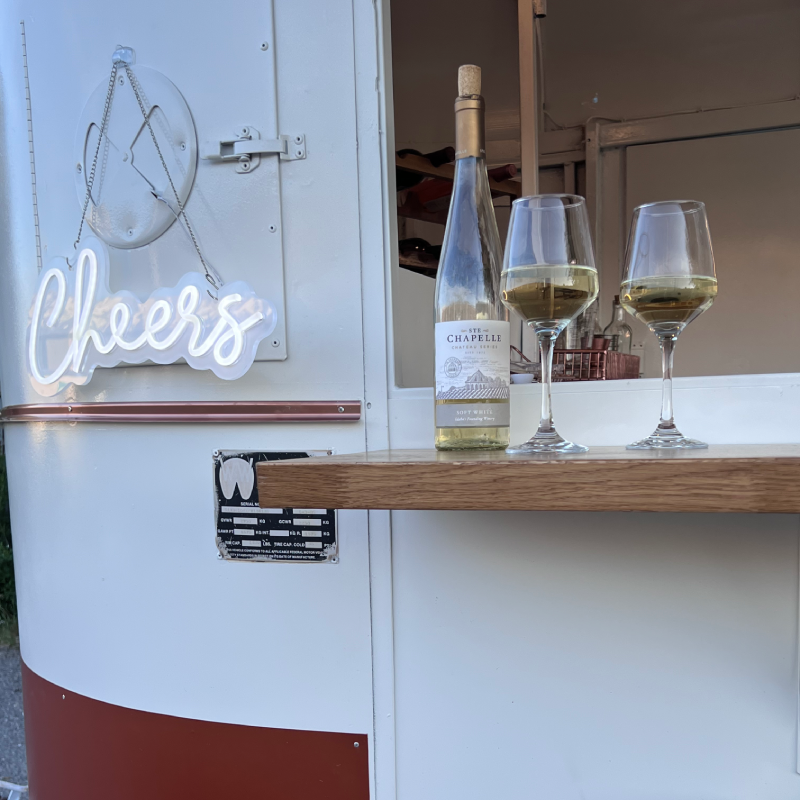 Photo of wine and glasses on the bar.