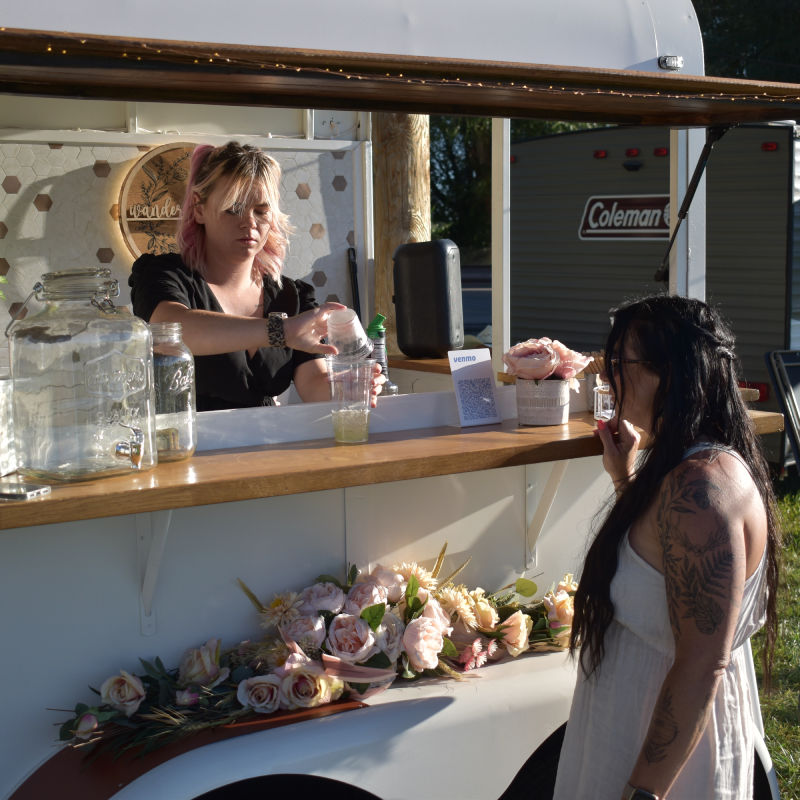 Photo of Harley (Bartender) behind the bar.